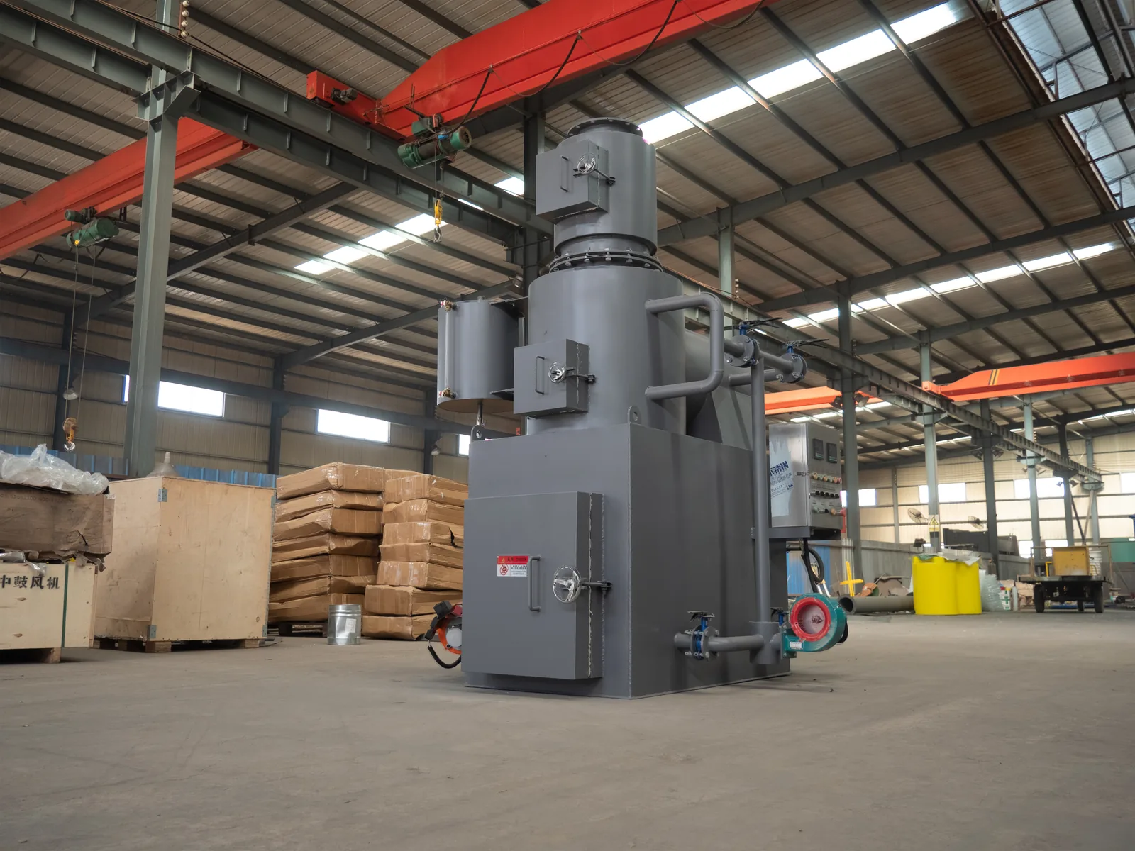Dual-chamber garbage incinerator with control cabinet and blower in our factory